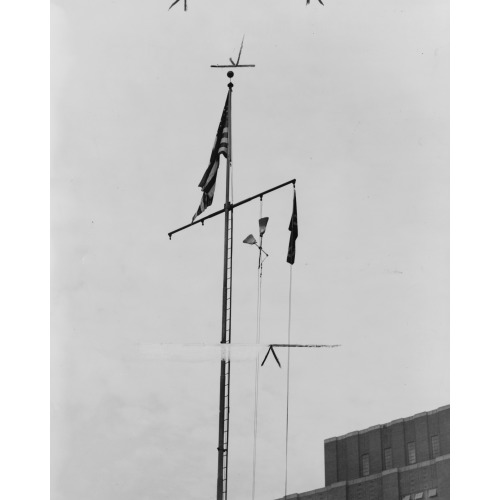 Brooms Lashed Together Over Roof Of Maritime Union Building On W 17 St