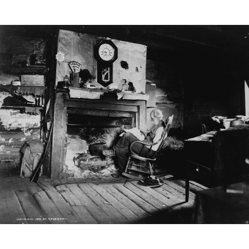 Elderly Man, Seated In Front Of Fireplace, With Clock Above, Reading, 1899