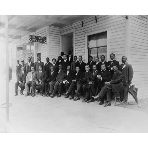 Booker T. Washington Seated With Group Of Men Outside The Office Of Dr. W.T. White, In Palatka...