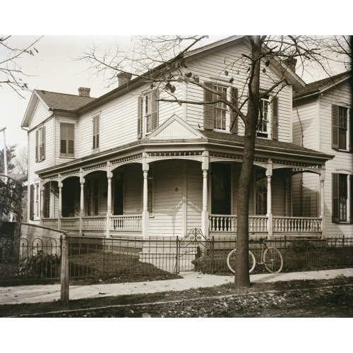 Front View Of 7 Hawthorn Street, The Wright Home, With Bare Trees And A Bicycle Resting By The...