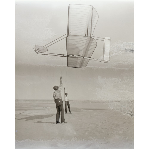 Side View Of Dan Tate, Left, And Wilbur, Right, Flying The 1902 Glider As A Kite, 1902
