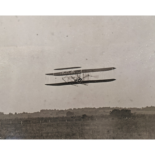 Flight 23: Front View Of The Machine In Flight To The Right, Orville At The Controls, Making Two...