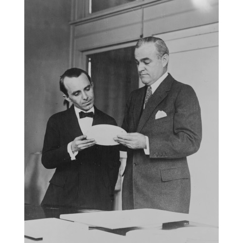 Director Of The Mint, Raymond T. Baker, And Anthony De Francisci Examining Model Of New Silver...