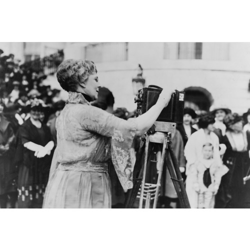 Florence Kling Harding Operating A Movie Camera On The Lawn At The White House, Washington...