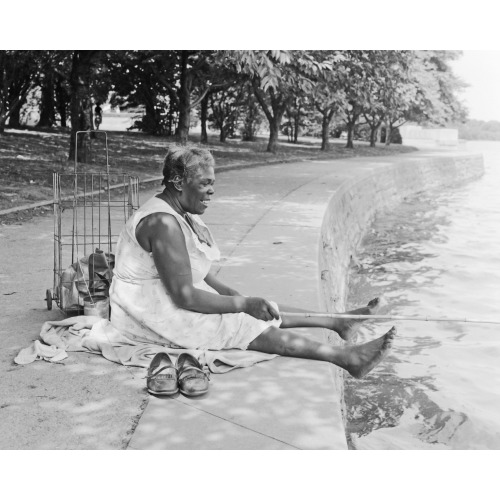 African American Woman, Seated On Ground, Fishing, At The Tidal Basin, Washington, D.C., 1957