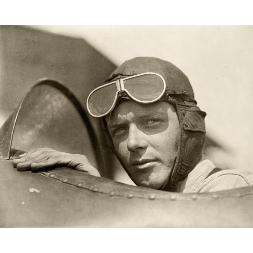 Charles Lindbergh, Wearing Helmet With Goggles Up, In Open Cockpit Of Airplane At Lambert Field...