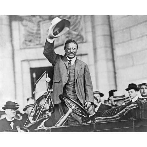 Theodore Roosevelt, Three-Quarter Length Portrait, Standing Up In Car, Waving Hat, circa 1909