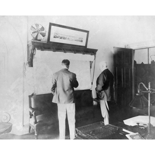 U.S. Secret Service Chief John E. Wilkie Examining Map In His Office, 1906