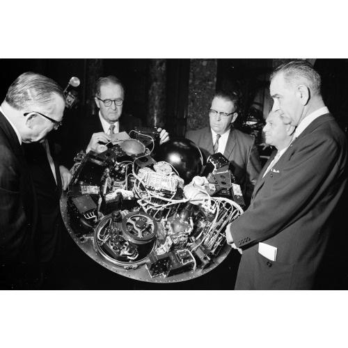 William G. Stroud Of NASA, Project Manager Of The Tiros I, Displaying The Satellite Circuitry To...