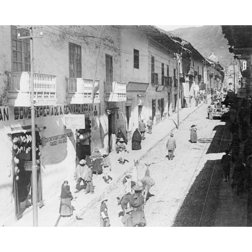 View Of The Calle Del Marquez, Cuzco, Peru, Showing Busy Street Scene With People And Llamas