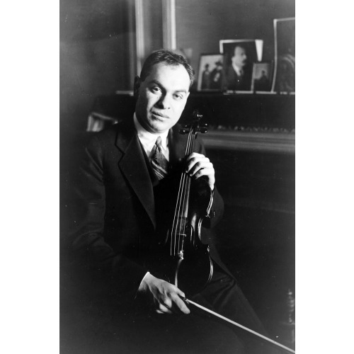 Eddy Brown, Seated, Holding His Violin, circa 1920