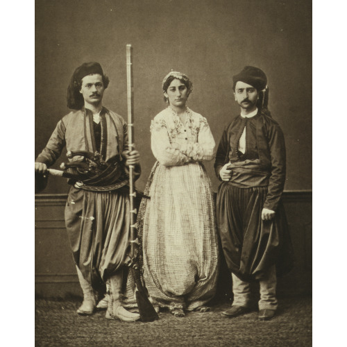 Studio Portrait Of Models Wearing Traditional Clothing From The Province Of Krid (Crete)...