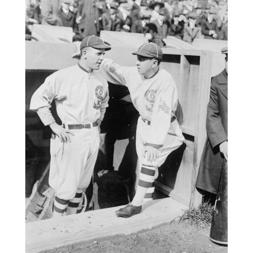 Clarence Pants Rowland, Manager Of The Chicago White Sox, (Right) Talks With His Pitcher, Eddie...
