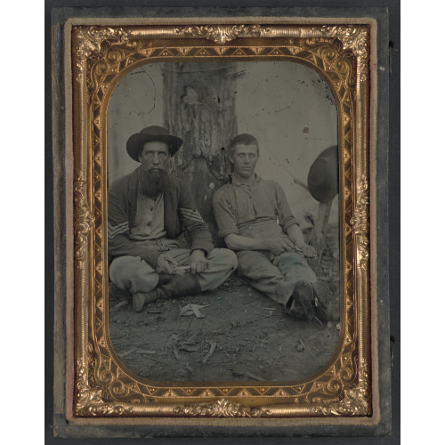 Unidentified Soldier In Union Uniform And Unidentified Young Man Sitting On The Ground And...