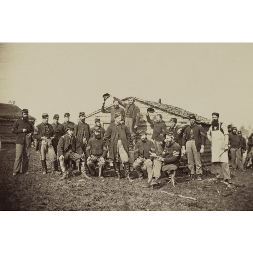 Group Of Soldiers Gathered Outside A Cabin, circa 1861