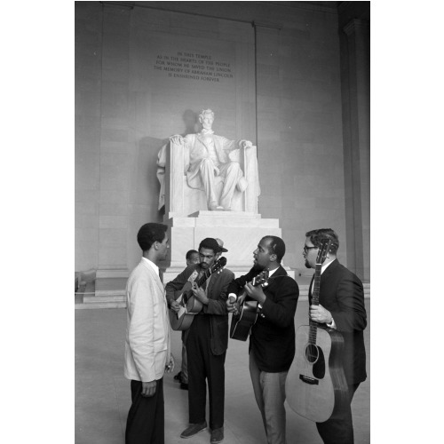 Men Playing Guitars And Singing Inside The Lincoln Memorial, View 1