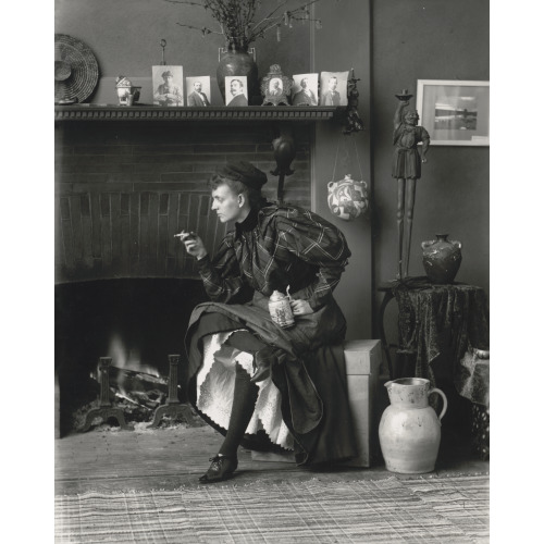 Frances Benjamin Johnston, Full-Length Portrait, Seated In Front Of Fireplace, Facing Left...